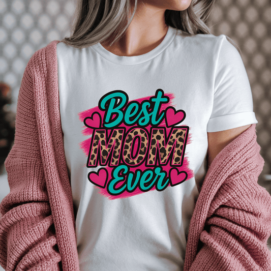 woman wearing white shirt with pink hat says best mom ever