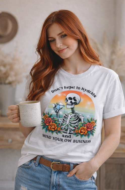 Skeleton Drinking Water T-Shirt — "Don't Forget to Hydrate and Mind Your Own Business" Retro Floral Tee