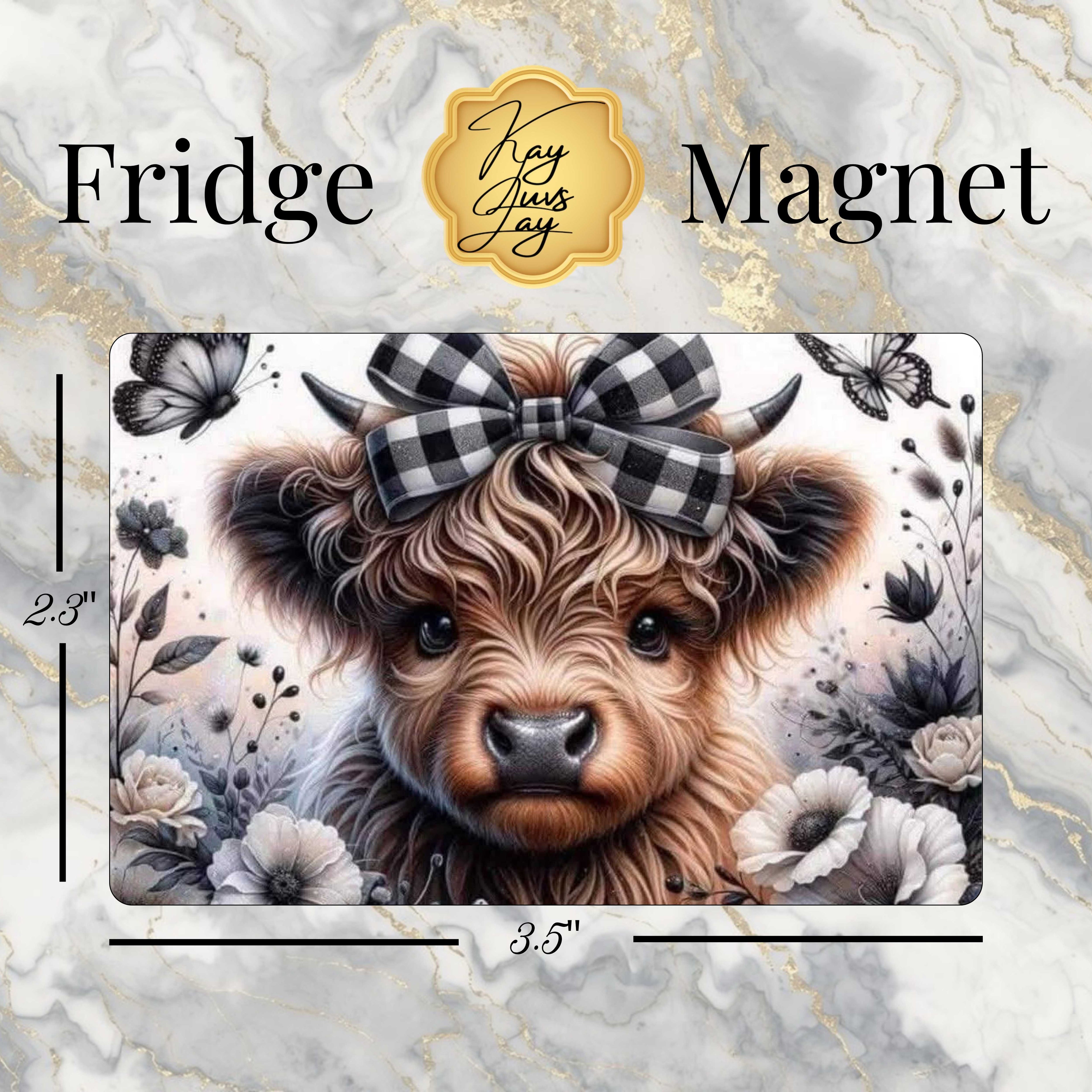 Fridge magnet with a cow design and measurement details on a marble background
