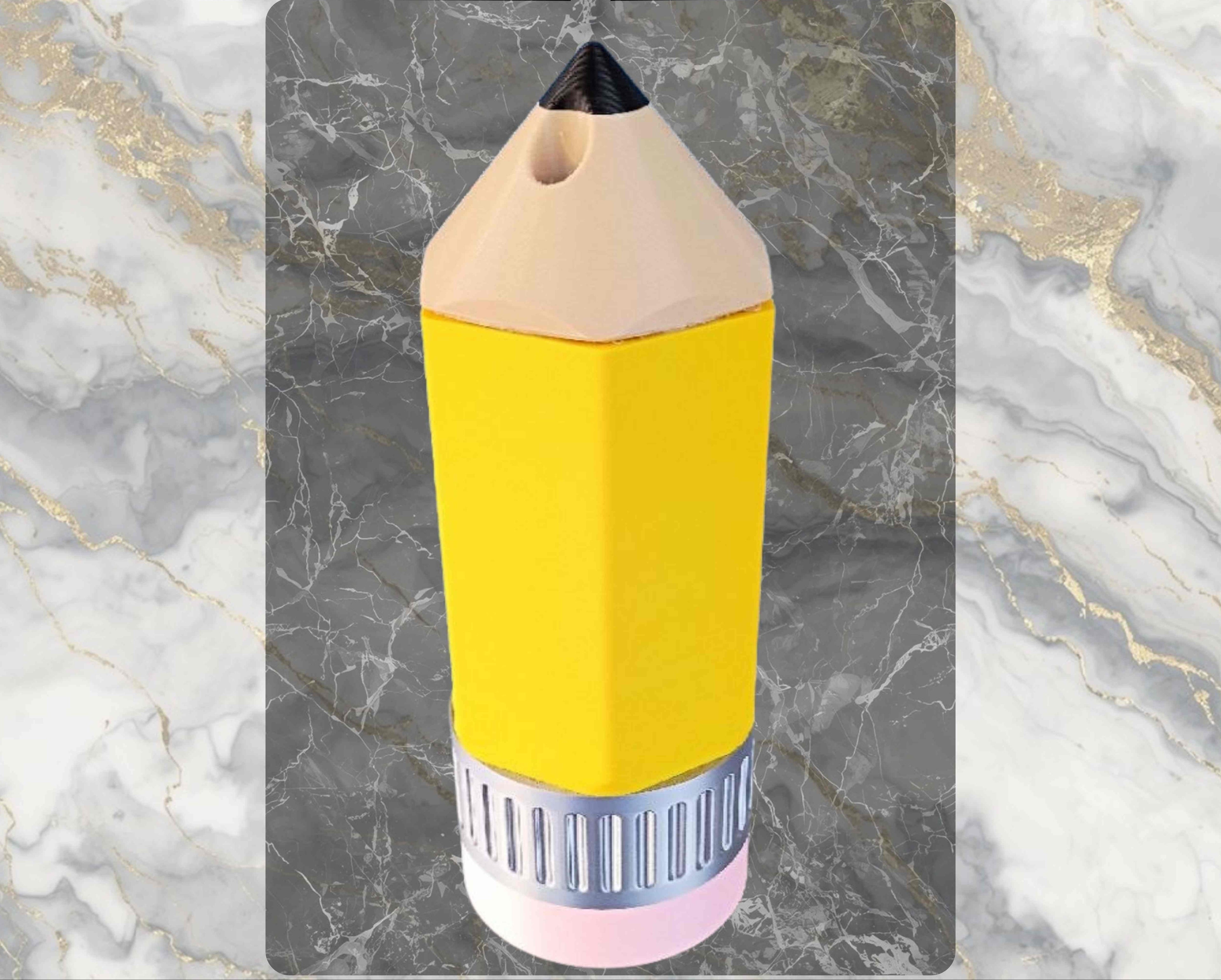 Yellow pencil-shaped bottle with black cap on a marble background