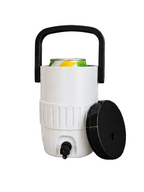 White cooler with black handle and lid on a wooden table outdoors